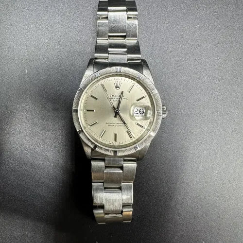 Rolex Oyster Perpetual Date Silver Dial 34mm Stainless Steel Engine-turned Bezel Watch 15210