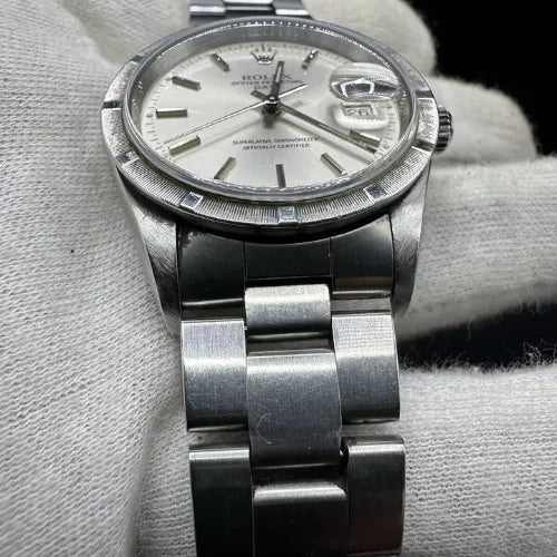 Rolex Oyster Perpetual Date Silver Dial 34mm Stainless Steel Engine-turned Bezel Watch 15210