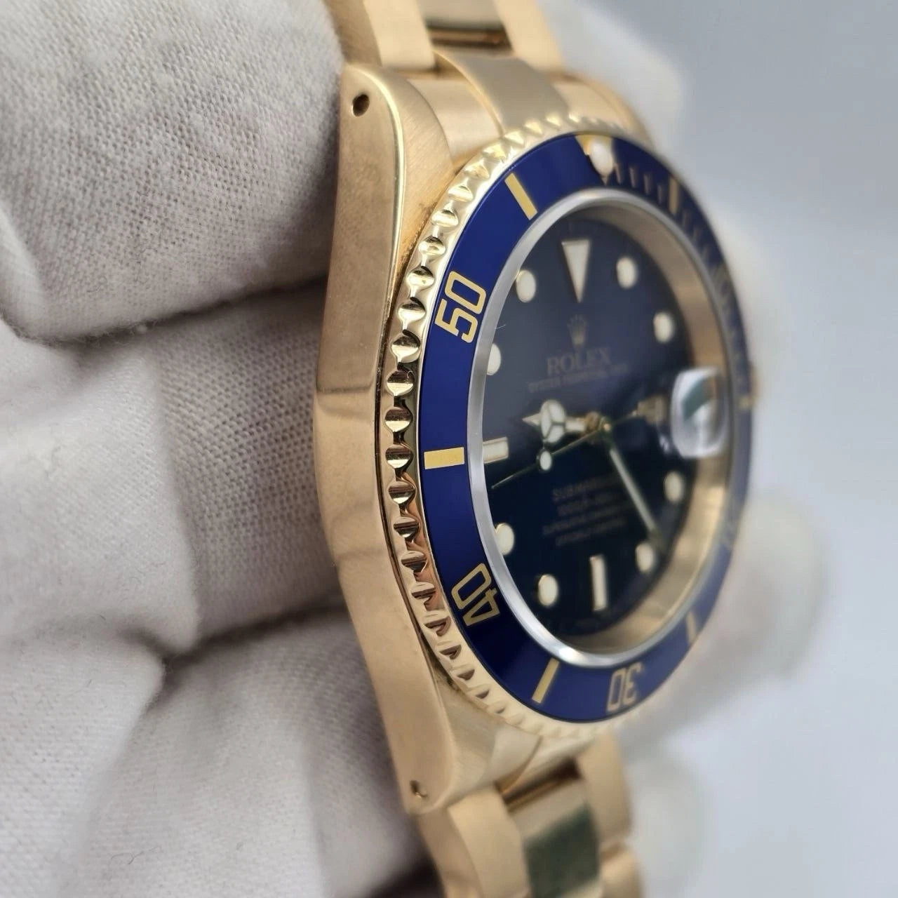 Rolex Submariner Date 16618 Yellow Gold Blue Dial