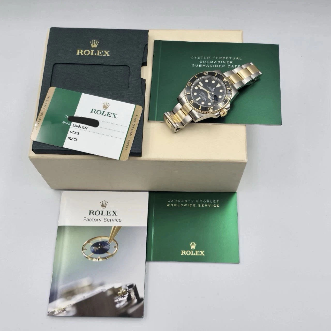2015 Rolex Submariner Date 40mm 18k Yellow Gold & Steel Black Watch 116613LN B+P