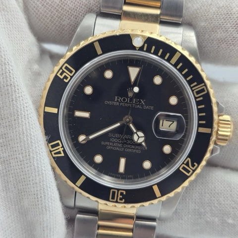 Rolex Submariner Date 18K Yellow Gold Black Stainless Steel 40mm Watch 16803