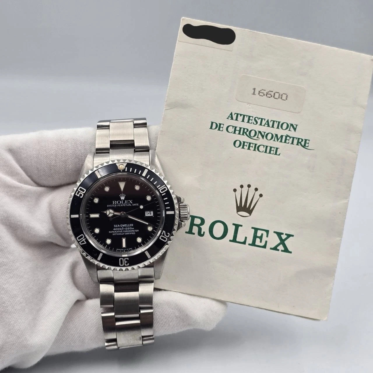 PAPERS Rolex Sea-Dweller 16600 Stainless Steel Black Dial 40mm Watch