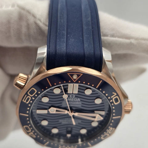 NEW 2023 Omega Seamaster Diver 300M Sedna Gold Blue Dial 210.22.42.20.03.002