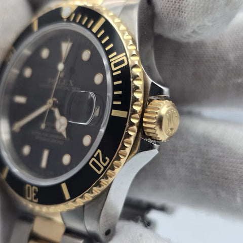 Rolex Submariner Date 18K Yellow Gold Black Stainless Steel 40mm Watch 16803