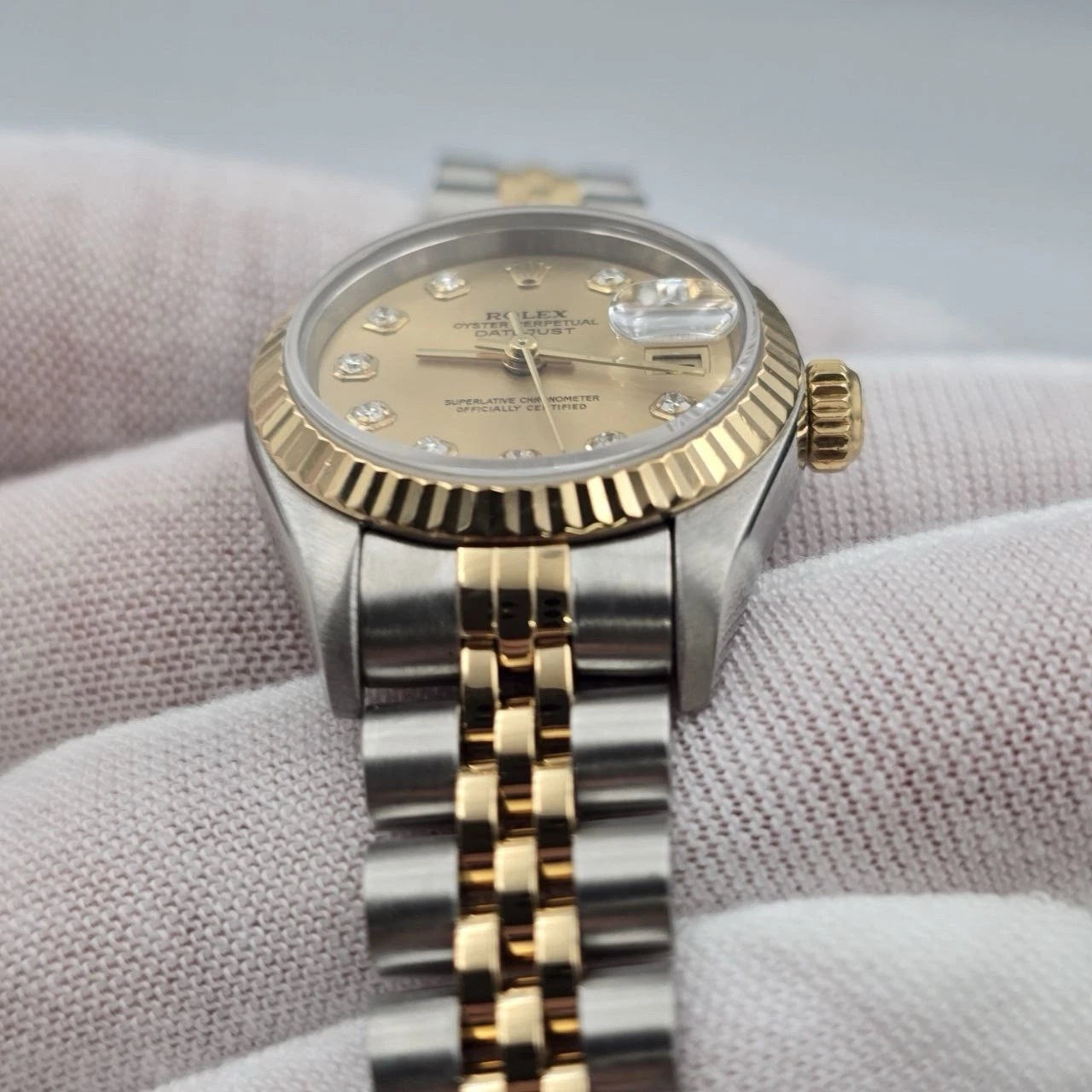 Rolex Datejust 79173 Fluted Bezel TT Jubilee Champagne Diamond Dial 26mm Watch