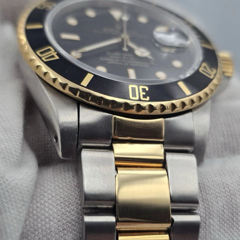 Rolex Submariner Date 18K Yellow Gold Black Stainless Steel 40mm Watch 16803