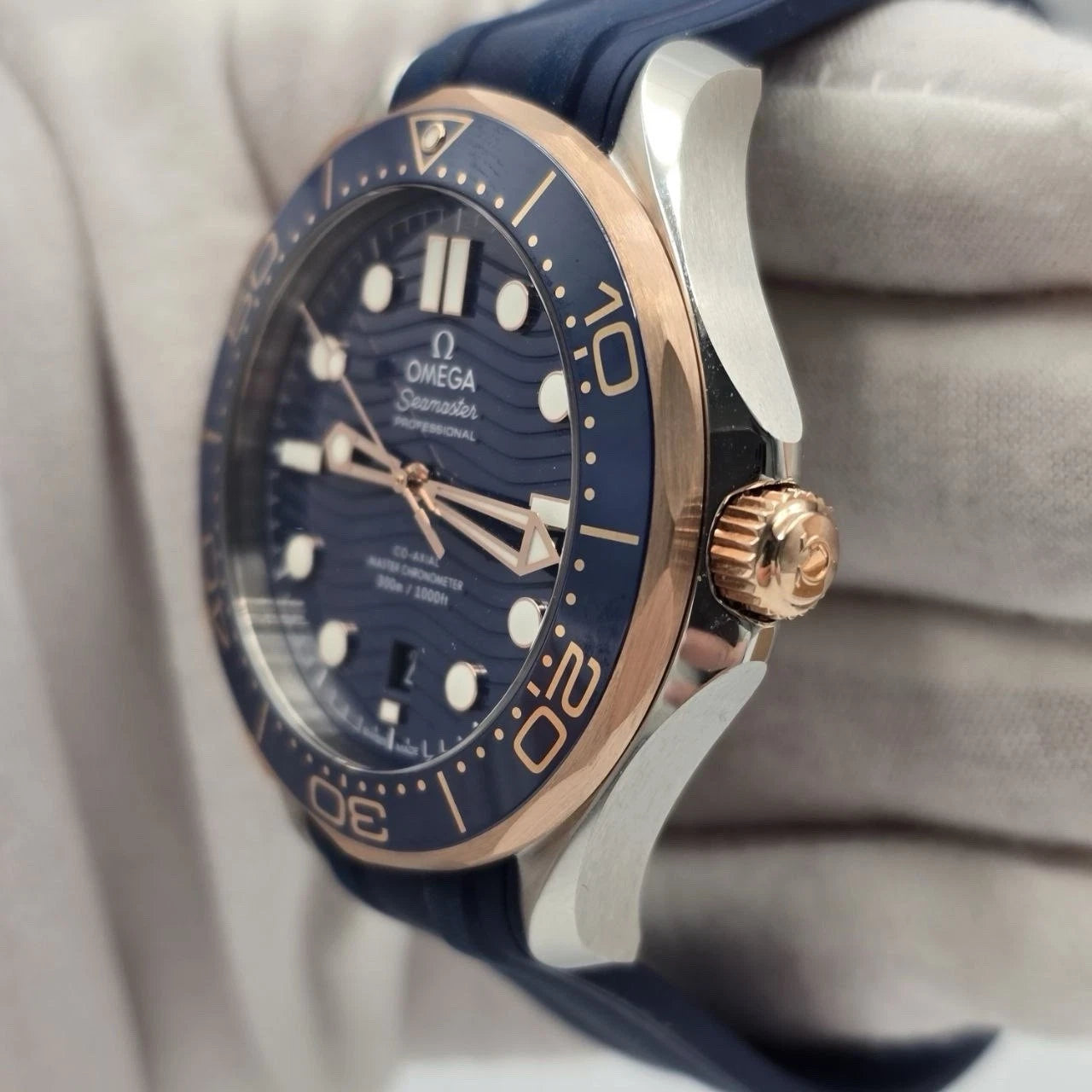 NEW 2023 Omega Seamaster Diver 300M Sedna Gold Blue Dial 210.22.42.20.03.002