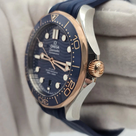 NEW 2023 Omega Seamaster Diver 300M Sedna Gold Blue Dial 210.22.42.20.03.002
