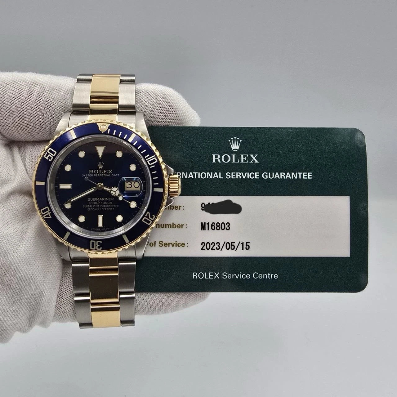 2023 RSC Rolex Submariner Date 18K Gold Blue Stainless Steel 40mm Watch 16803