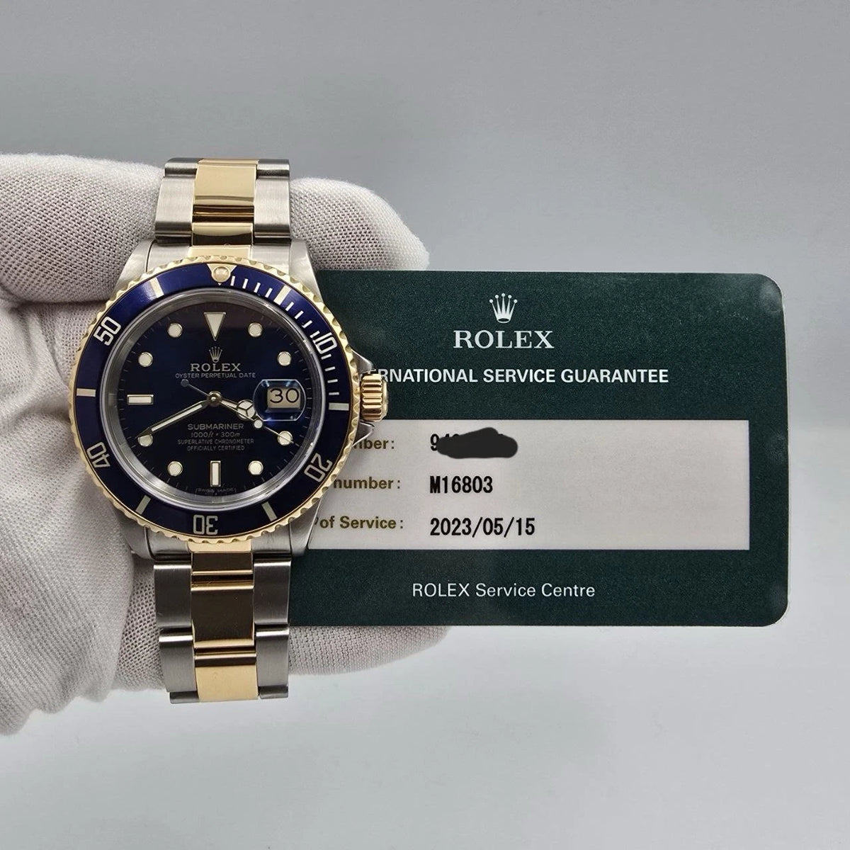2023 RSC Rolex Submariner Date 18K Gold Blue Stainless Steel 40mm Watch 16803