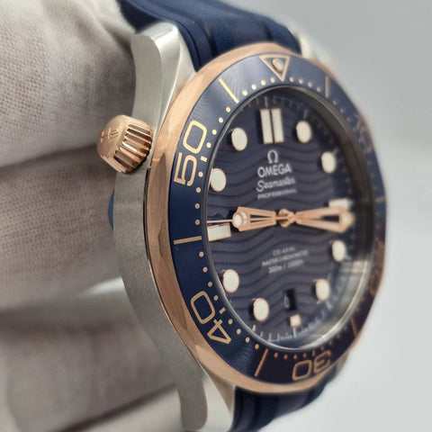 NEW 2023 Omega Seamaster Diver 300M Sedna Gold Blue Dial 210.22.42.20.03.002
