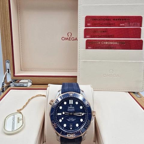 NEW 2023 Omega Seamaster Diver 300M Sedna Gold Blue Dial 210.22.42.20.03.002